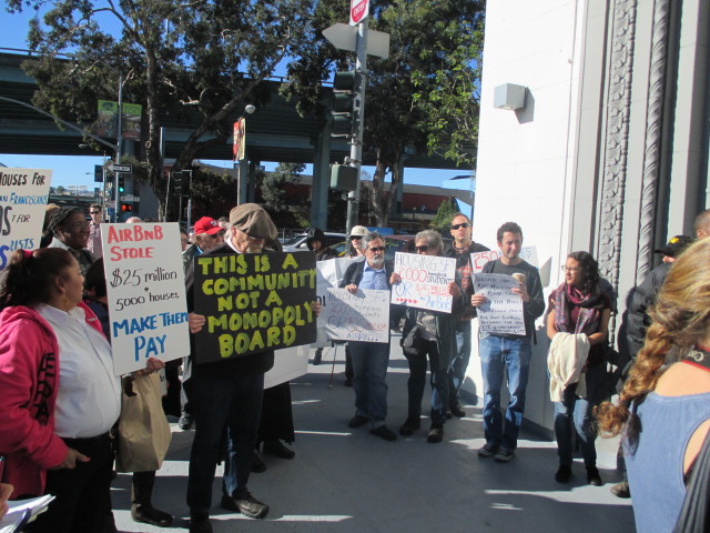 A crowd in front of Airbnb kicks of a campaign for a 2015 ballot measure