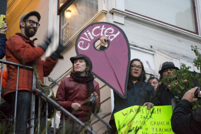 Evan Wolkenstein, far left, and Claudia Tirado, second from right, fight eviction. Keeping people housed is a key element of any homeless policy. Photo by Sara Bloomberg