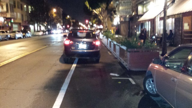 Uber driver blocks the bike lane on Valencia