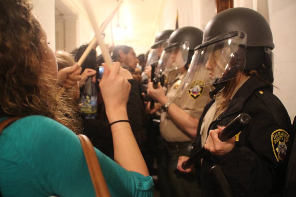 Protestors and police face off