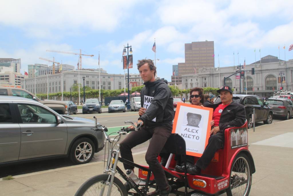 Elvira and Refugio Nieto in a Pedicab outside City Hall 