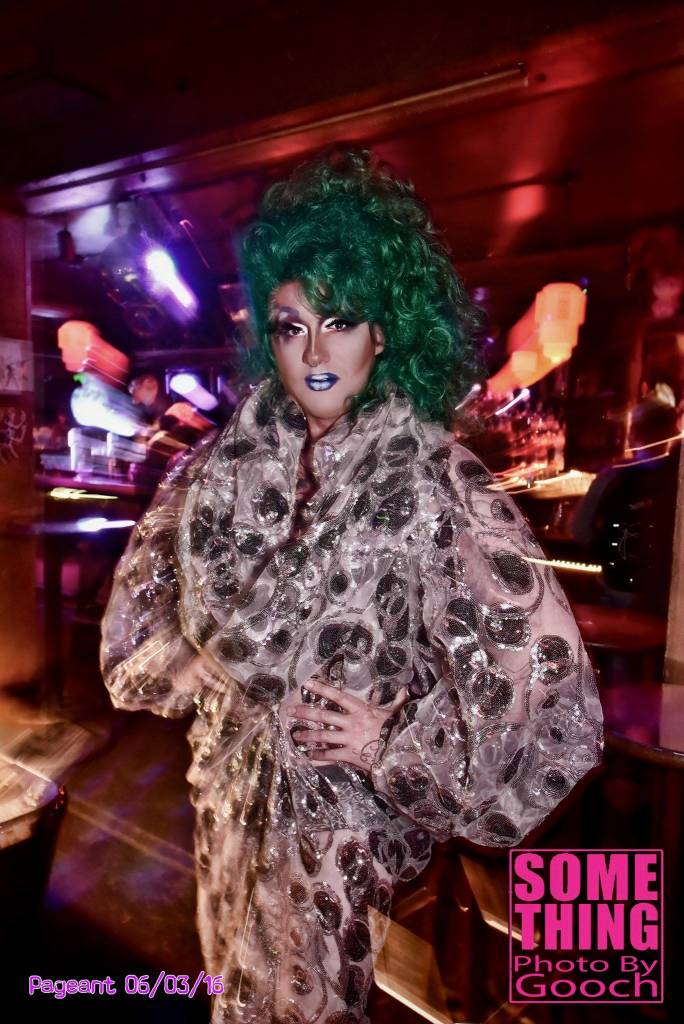 Mica Sigourney as VivvyAnne ForeverMore, hostess of the weekly Friday Club Some Thing drag night. 