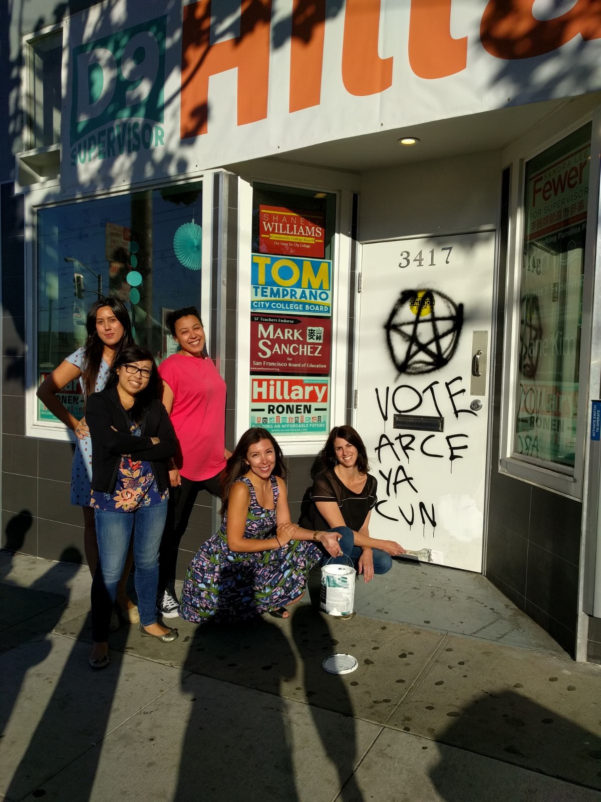 Hillary Ronen and her campaign staff paint out misogynist graffiti