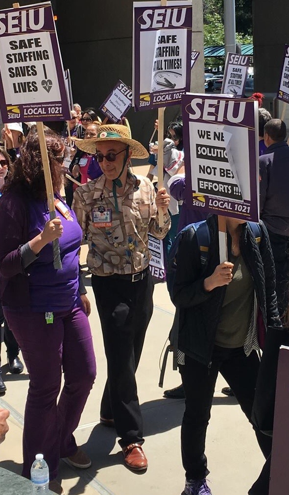 The author protests staff cuts at Wells Fargo Plaza