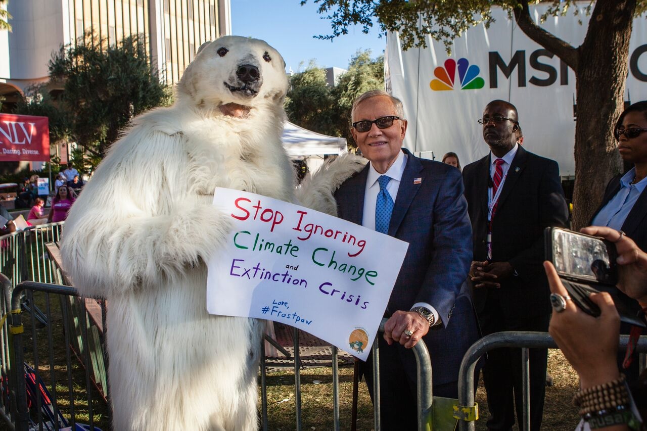 Sen Harry Reid poses with Frostpaw. Photo by Tim Daw