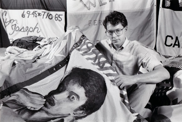 Jones with a panel from the AIDS Quilt.