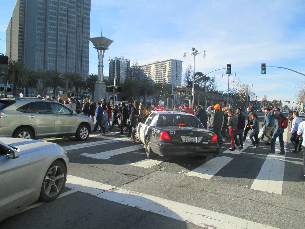 The cops stop traffic on the Embarcadero