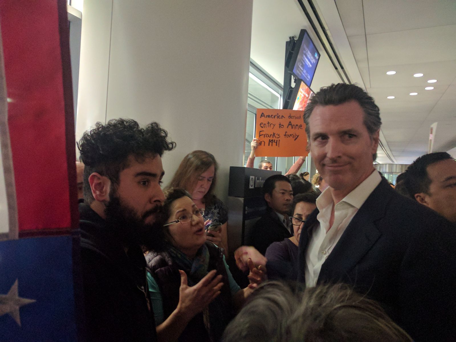 Seyvani and his mother with Gavin Newsom