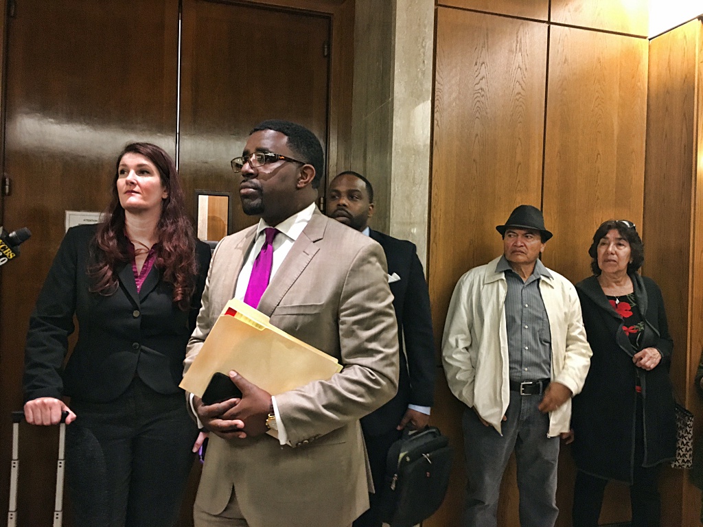 Attorney Adante Pointer answers questions after the hearing on Monday. Photo by Sana Saleem. 
