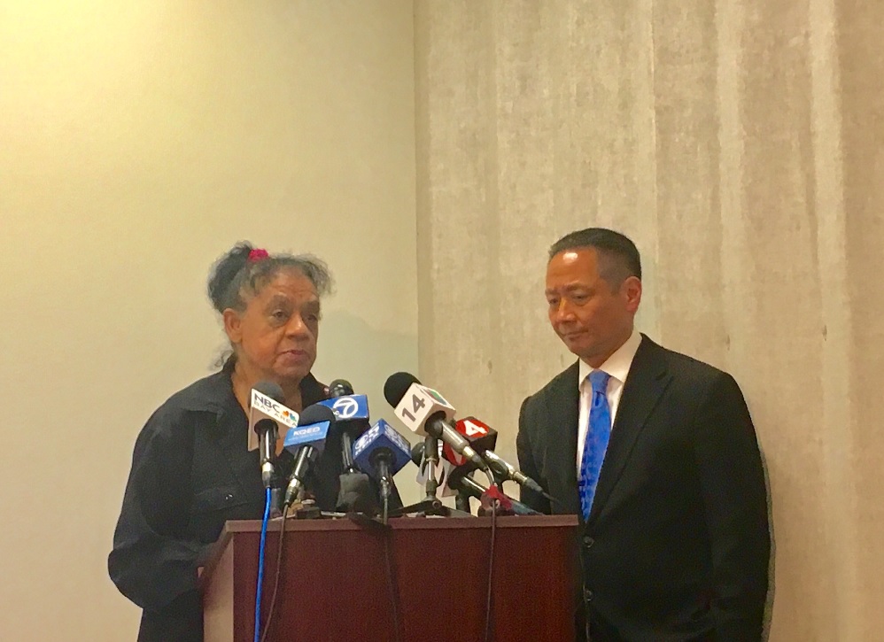 Sean Moore's mother, Cleo Moore, stands with Public Defender Jeff Adachi during a press conference on April 25th. Photo by Sana Saleem. 