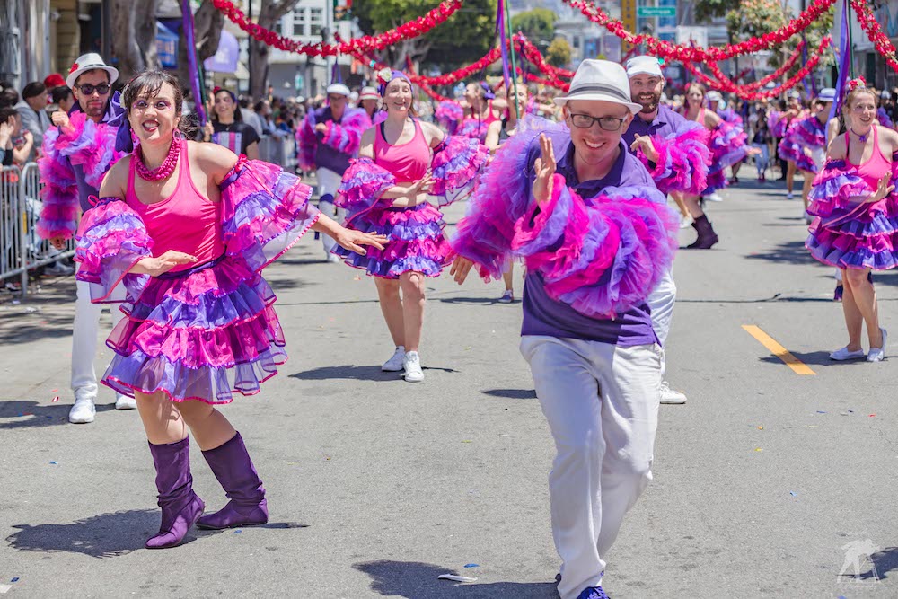 Colorful dancer with body paint at carnaval parade in Mission