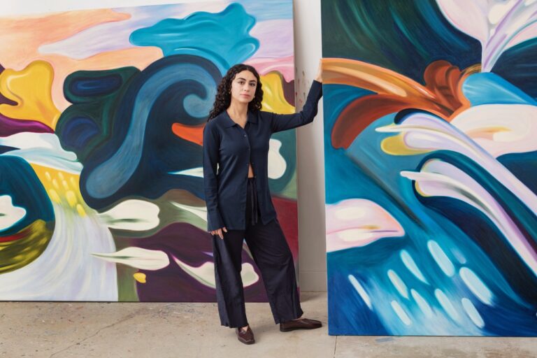 Painter Hayal Pozanti puts hands on the canvas